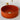 vasque en béton rouge, forme cylindrique ronde