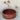 vasque ronde en beton mineral teinte rouge grenat